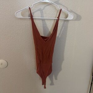 Low vneck cross back bodysuit